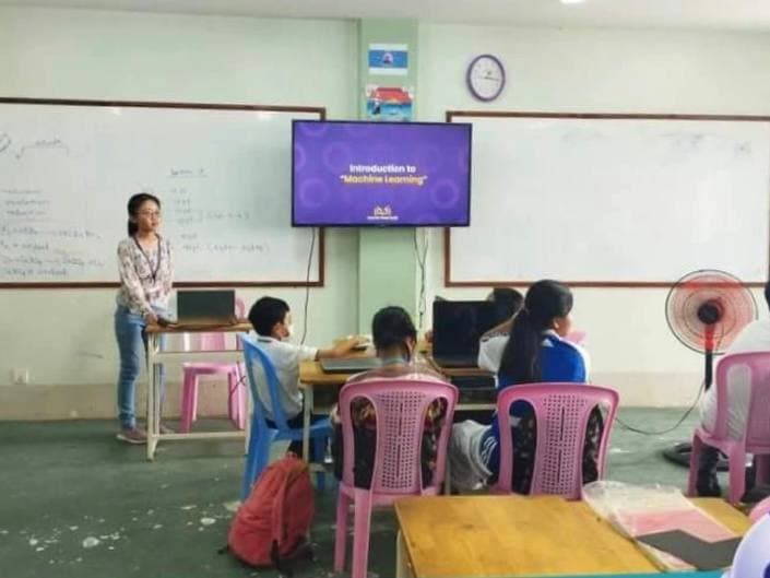 Teaching a coding session in Myanmar